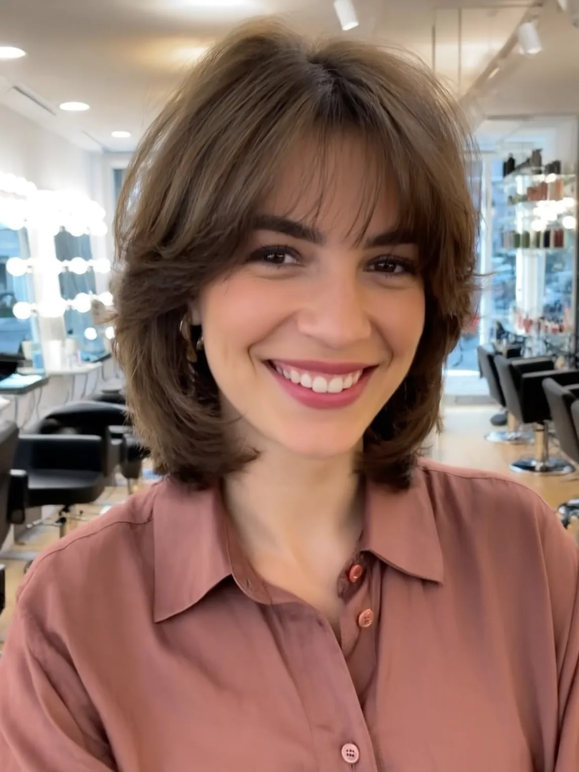Medium-Length Wavy Layered Bob with Curtain Bangs in Chestnut Brown